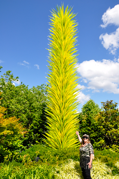 Karen Duquette and the big yellow sculpture